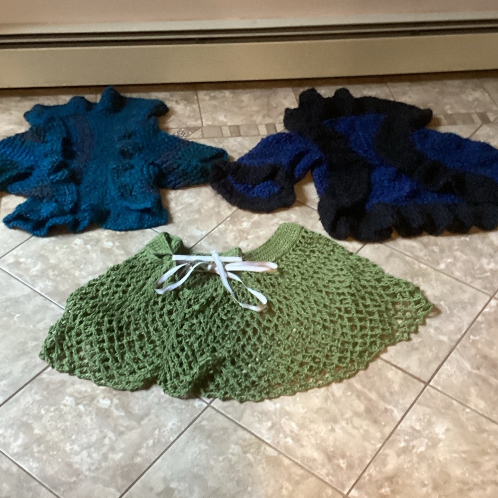 Handmade crochet Sweaters and Shrugs. All new and perfect for gift giving.